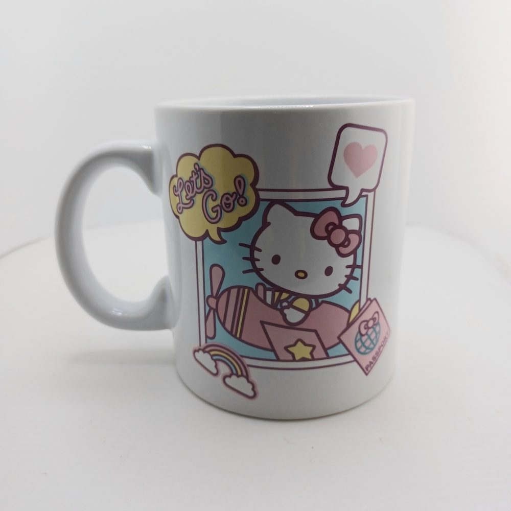 Hello Kitty Ceramic Mug Flying a Plane, 20 Oz Mug